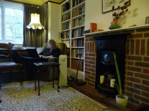Diana Glyer writes in the Common Room at The Kilns